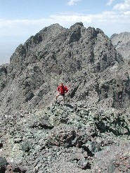 Cave Dog with Crestone Peak